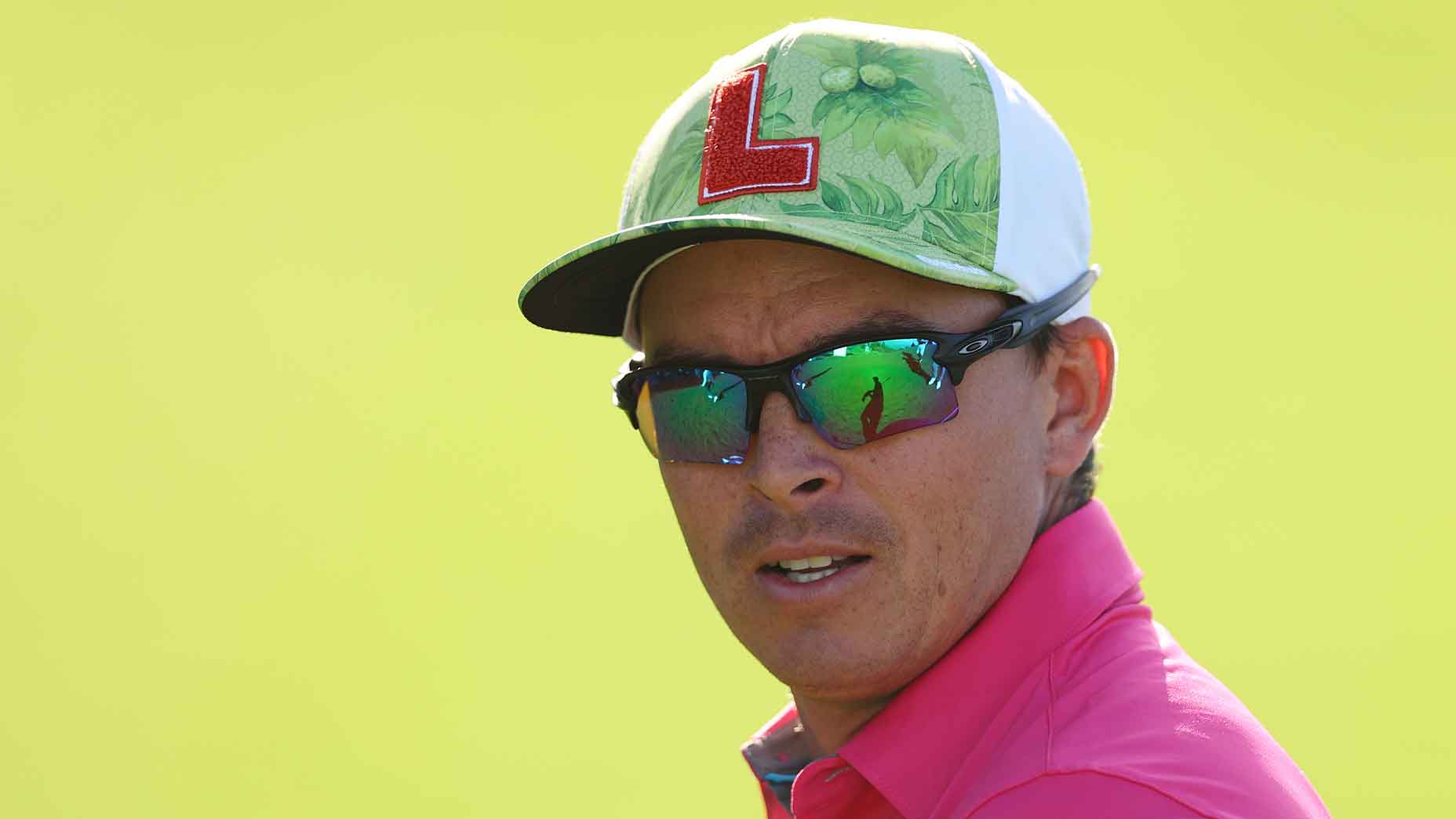 Discover Rickie Fowler L Hat: Stylish Golf Apparel from Puma