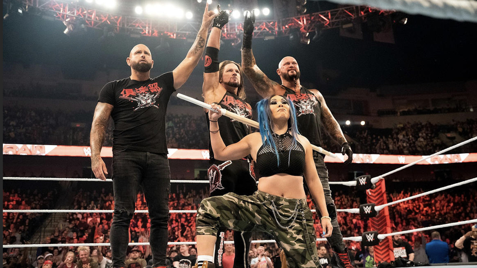 Is Michin WWE part of The O.C. faction? Find out about her current team status.